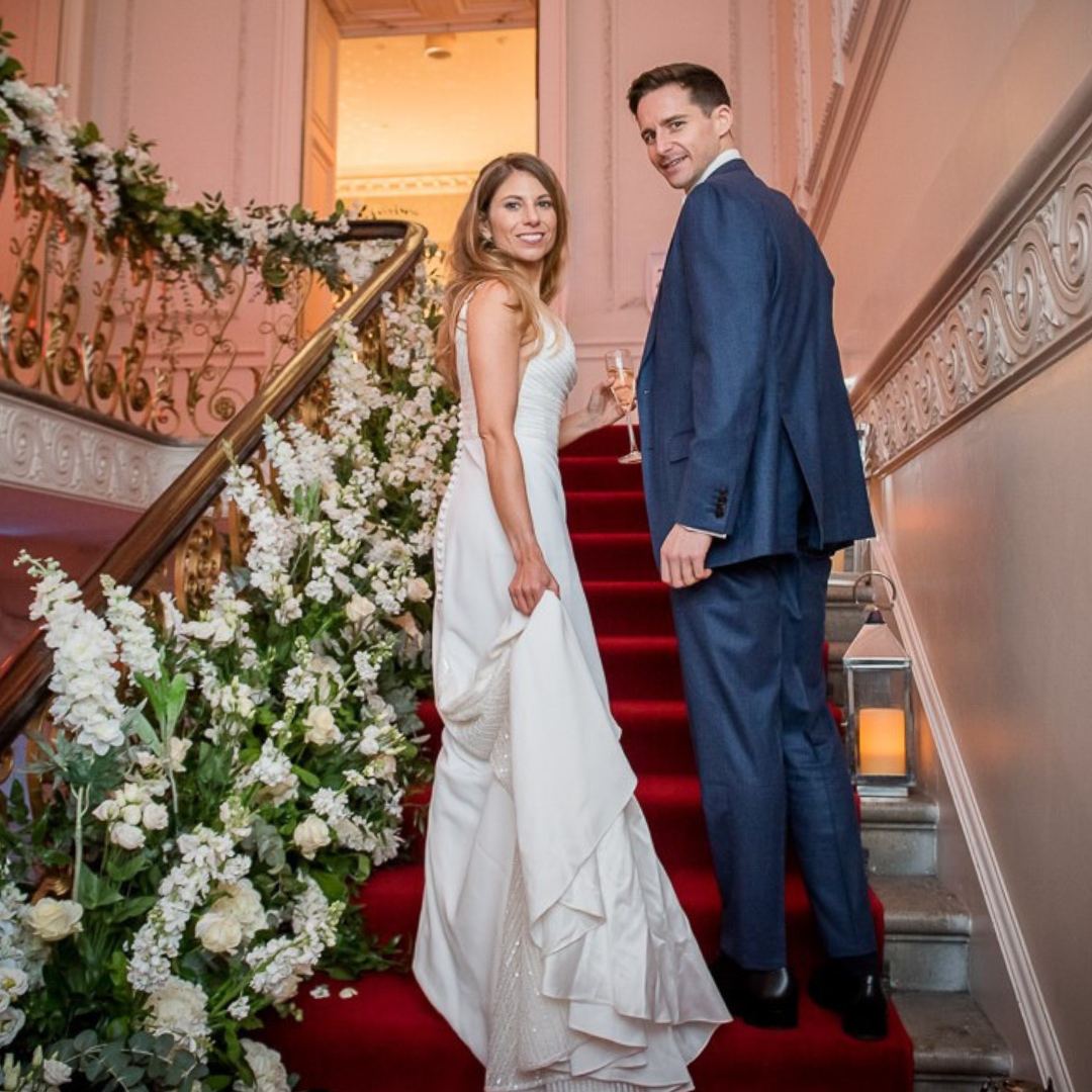 White Floral Staircase Winter Wedding